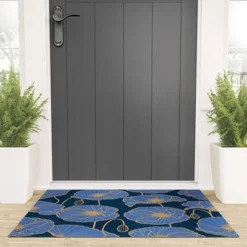 Emanuela Carratoni Moody Blue Garden Welcome Mat - Deny Designs