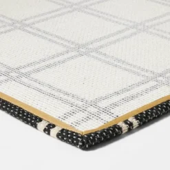 1'6"x2'6" Indoor/Outdoor Plaid Scatter Halloween Doormat Black/White - Hyde & EEK! Boutique™ -Bedding Discounts GUEST 61fba789 c646 4b6a 8307 45e32a6f8042