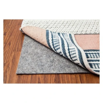 Surface Solid Woven Rug Pad - Anji Mountain 1 Surface Solid Woven Rug Pad - Anji Mountain