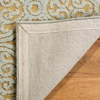 Stacy Medallion Tufted Accent Rug - Safavieh 2 Stacy Medallion Tufted Accent Rug - Safavieh - Image 2