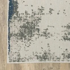 Trinity Modern Distressed Abstract Patio Area Rug Beige/Blue - Captiv8e Designs -Bedding Discounts GUEST f556174a 2acc 40ac b0be af804991c17b